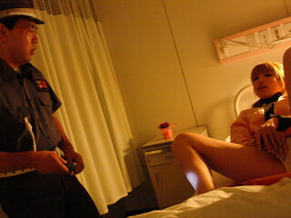 Hatsuka inspects two policemens dicks with her mouth